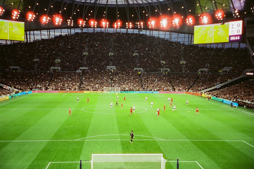 Football goalkeeper and stadium match scene