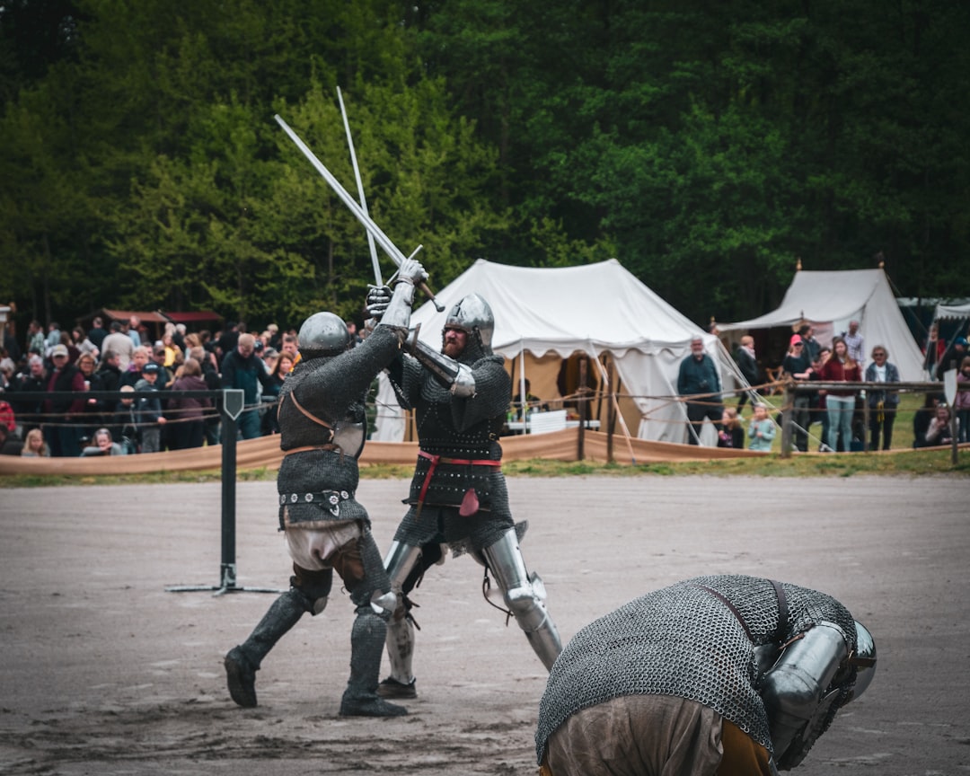 Sword fight in a forest setting